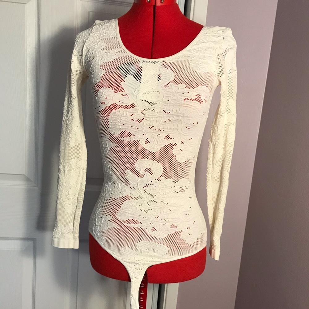Brand new bebe cream lace bodysuit